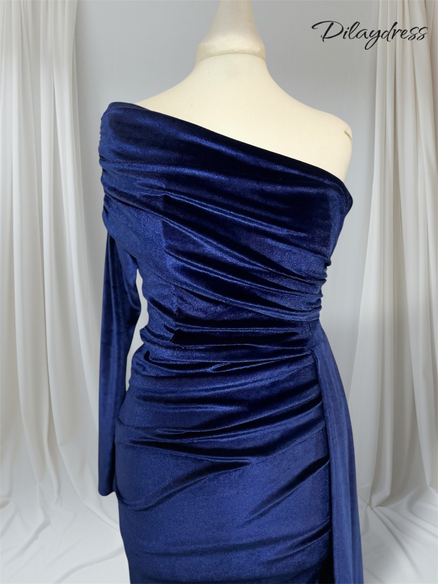 ÉLÉGANCE ASYMÉTRIE EN VELOURS BLEU